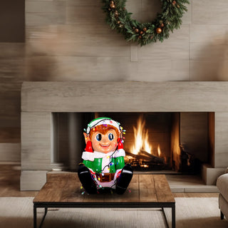 ELF BOY PLAYING LIGHTS